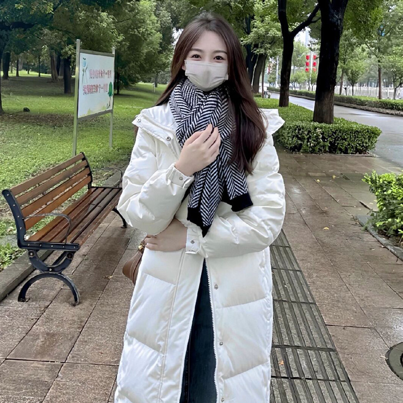 中戏同款白色羽绒服女中长款2025年冬季新款过膝白鸭绒面包服外套