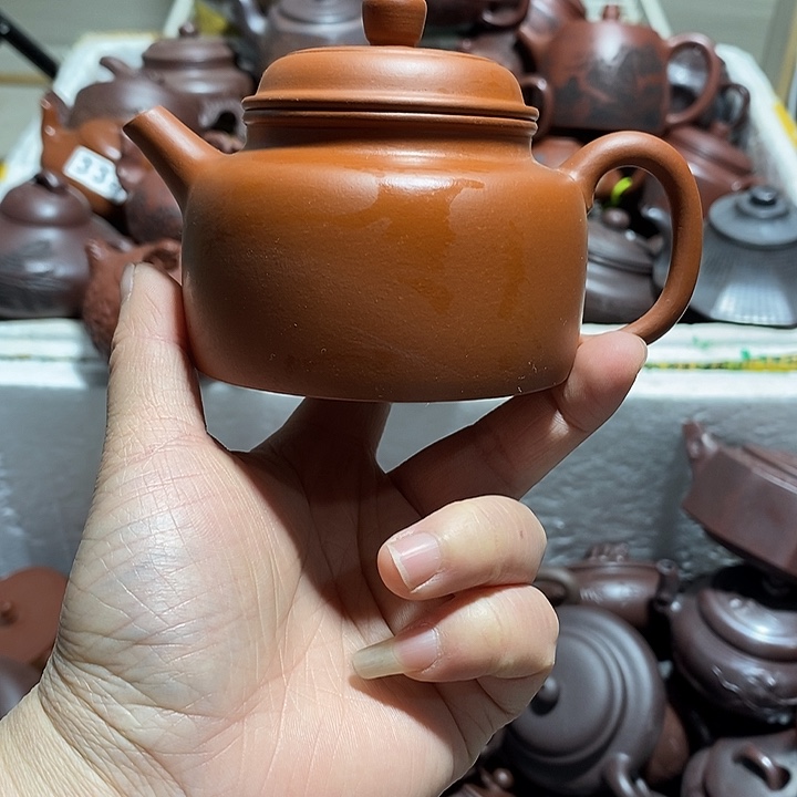 紫砂茶壶微瑕微笑