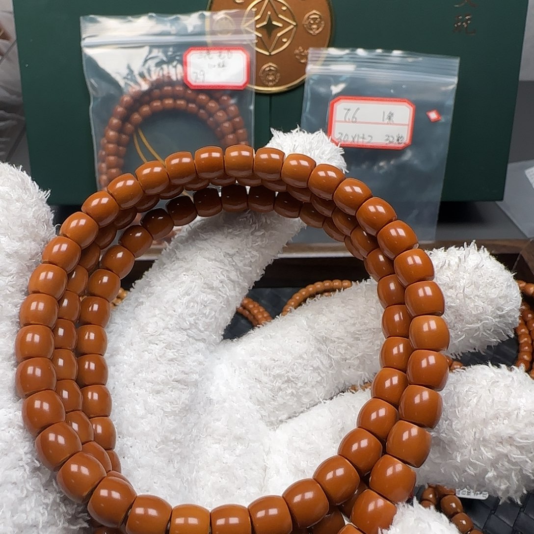 阿***生橄榄核吊坠8.2mm老挝直切三花面无白核尖长串收藏级