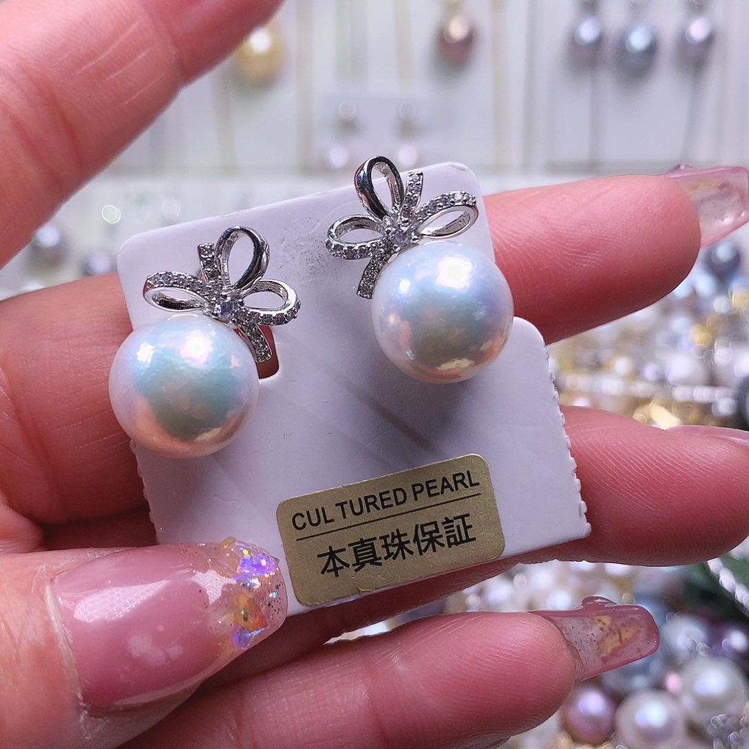 淡水珍珠耳饰银S925镶嵌我****呀