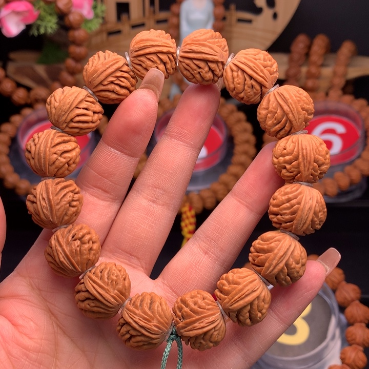 桃核吊坠1.7元宝刺龙手串