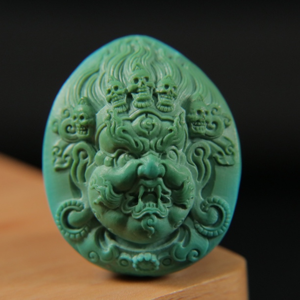 原矿绿松石玉化料大黑天 尺寸28×34×18mm，重19.94g，已打天地孔
