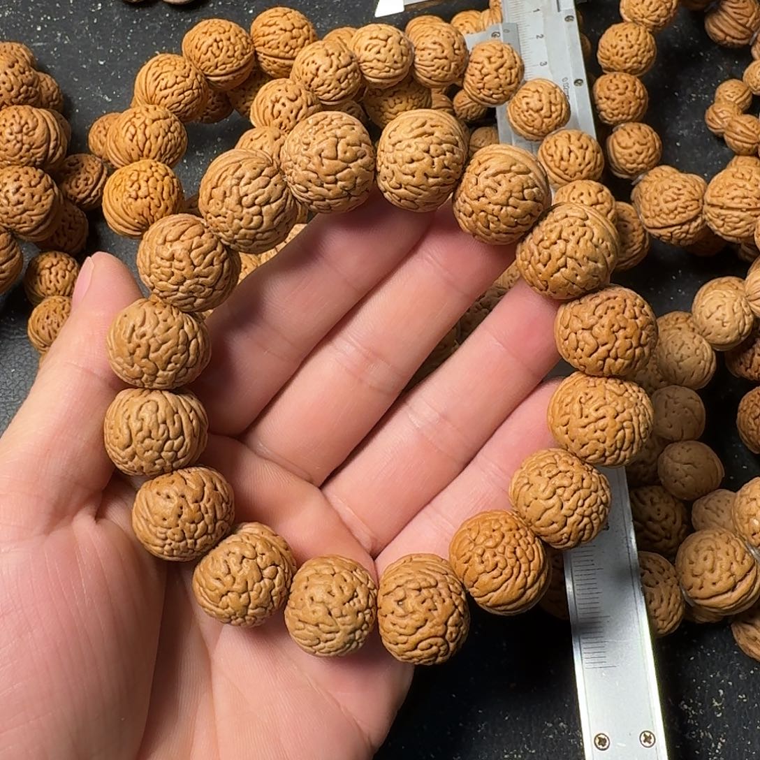 6***6吊坠桃核盘锦肌肉手串