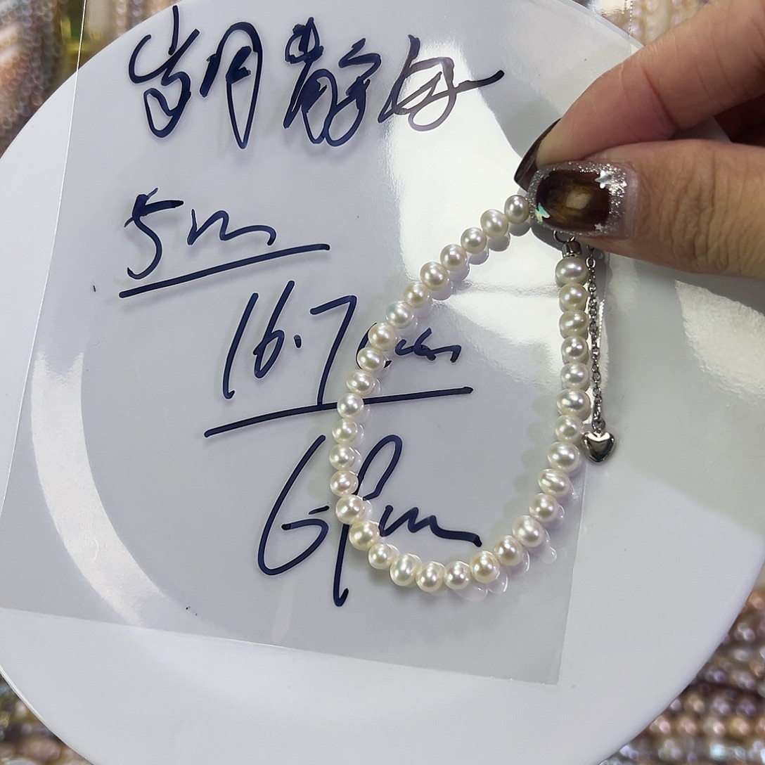 岁****手绳淡水珍珠钛钢