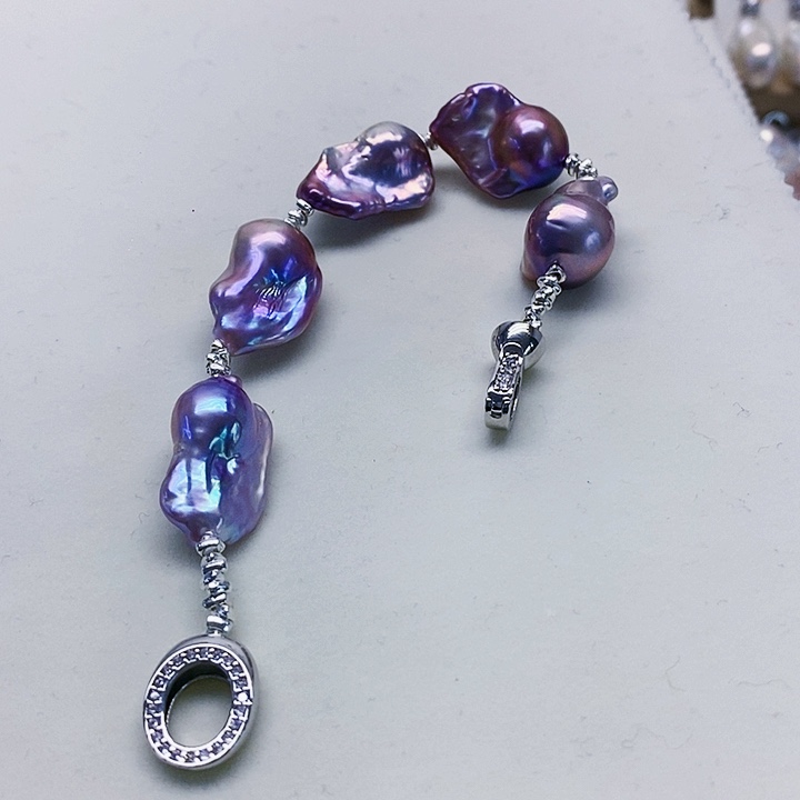 银S925镶嵌耳饰淡水珍珠浅*笑