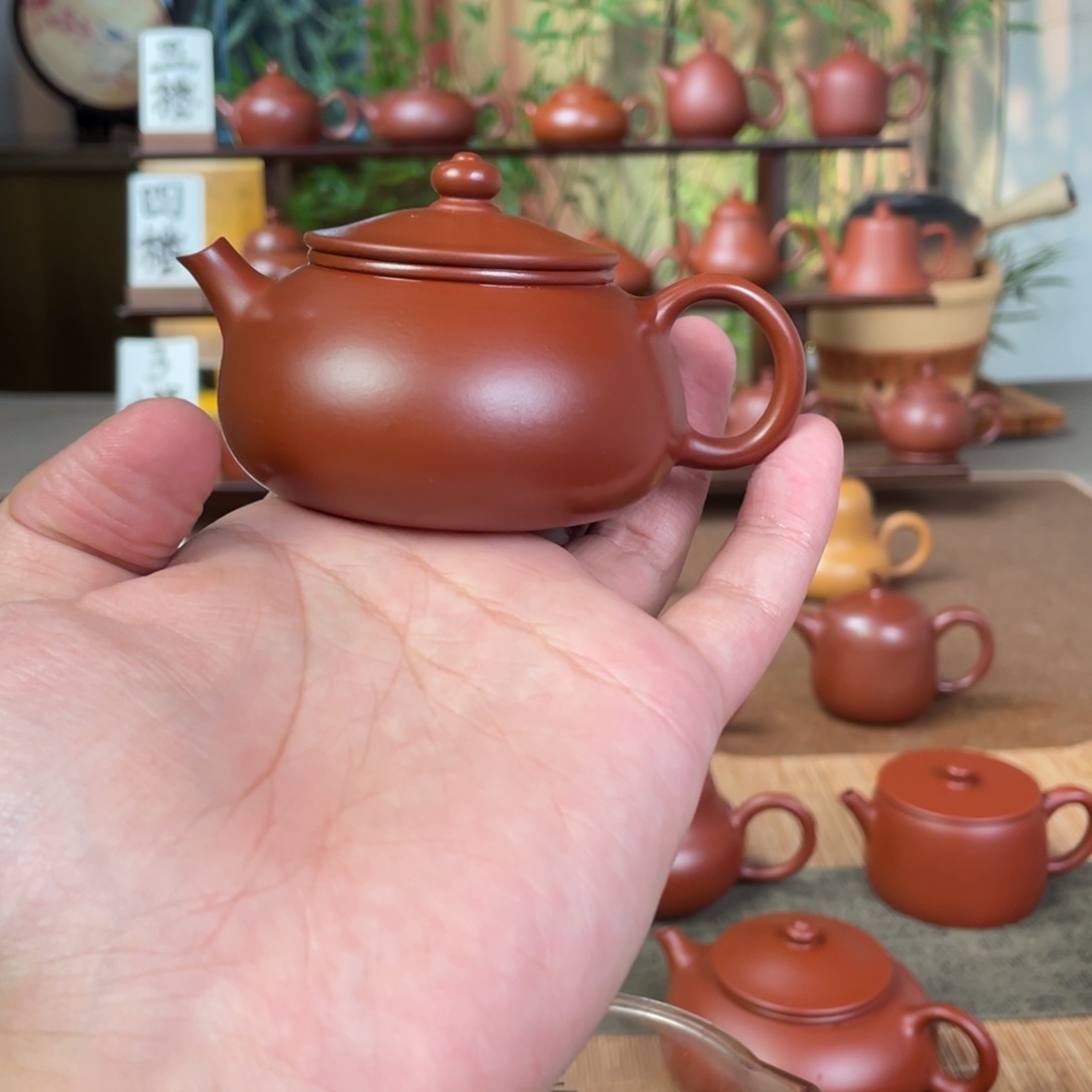 紫砂潮州手拉壶粤***心寒江精工