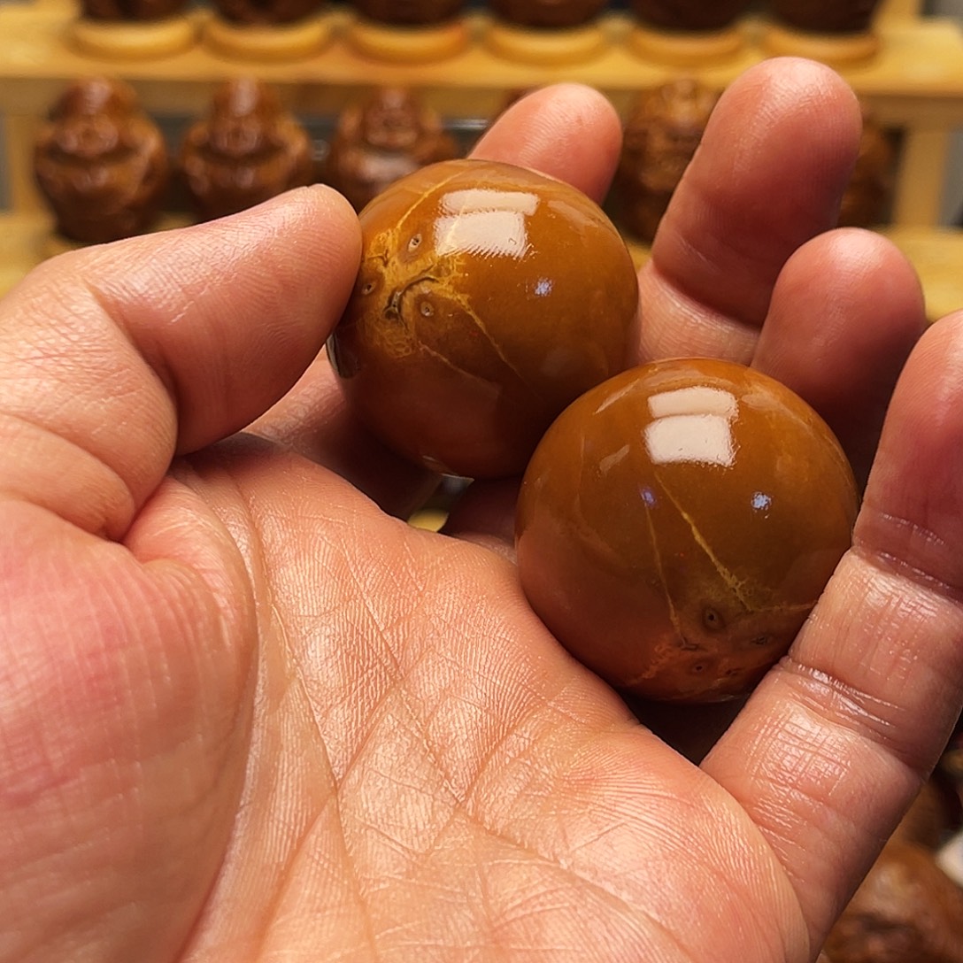 国***典橄榄核把件光珠手球