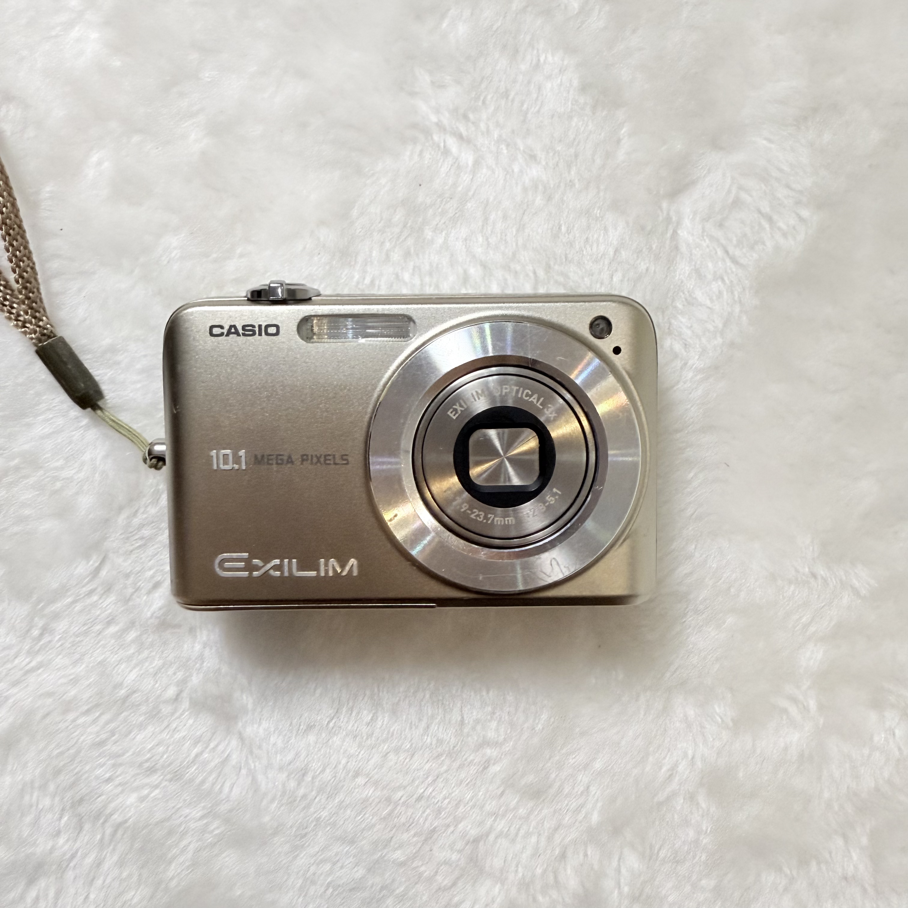 95新 Casio/卡西欧 Z1050 1010w像素冷白奶油肌电池盖松