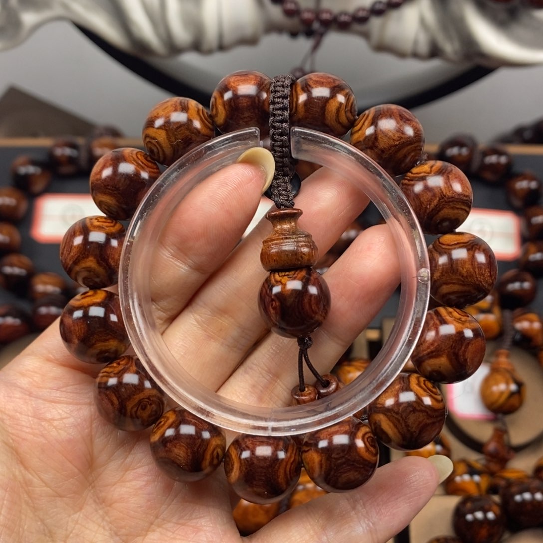 【闪购商品】黄花梨/降香黄檀1.5黄金底对眼鬼脸
