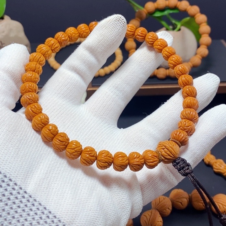 胡桃木野生凤羽手持