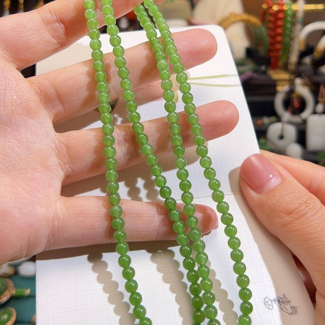 和田玉挂件18K金镶嵌