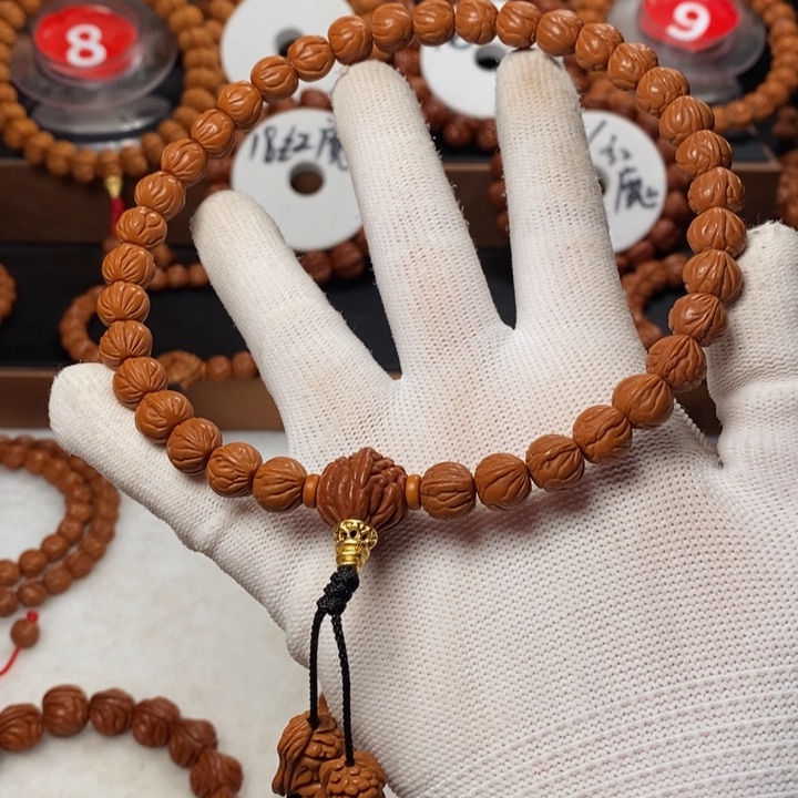 桃核手串沈****司秦岭龙纹