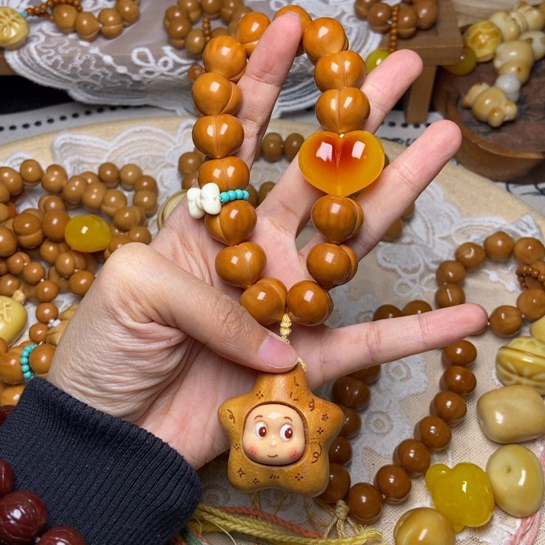 吊坠猴头核桃屁桃玻璃底卡16