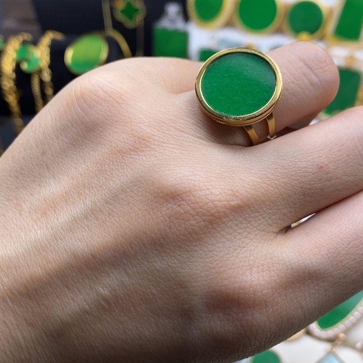 叹***茶花岗石钛钢钛钢时尚圆牌戒指