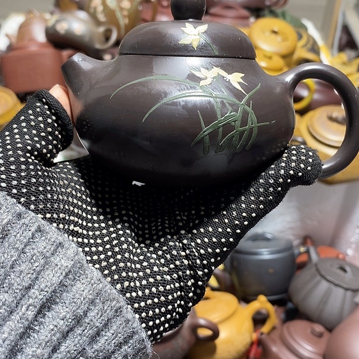 紫砂茶壶划痕微笑