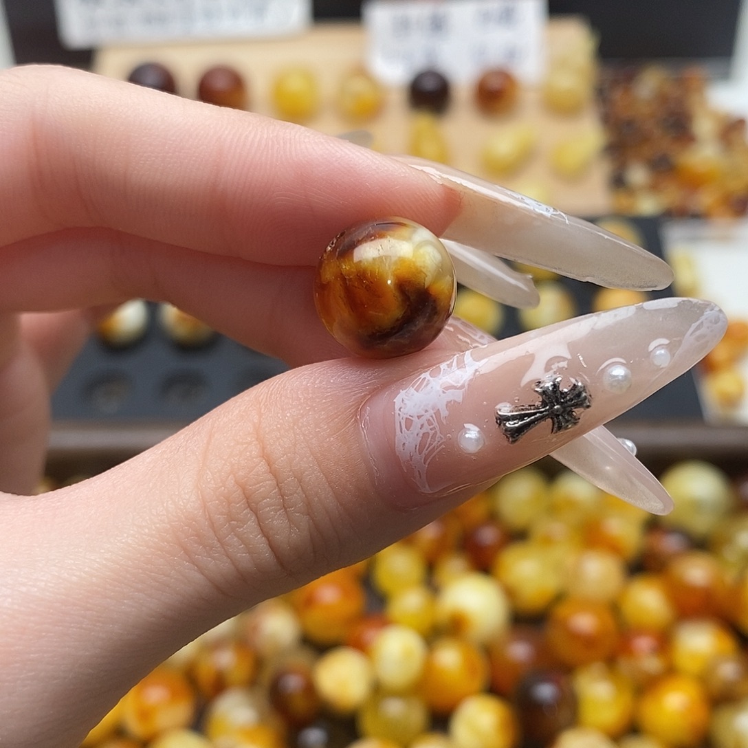 余***波蜜蜡未镶嵌裸石蜜蜡