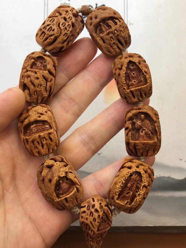 桃核手工雕刻无相佛手持