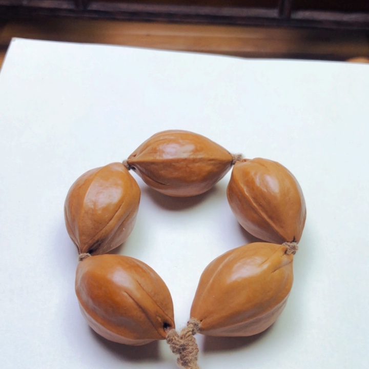 橄榄核把件梅林铁核