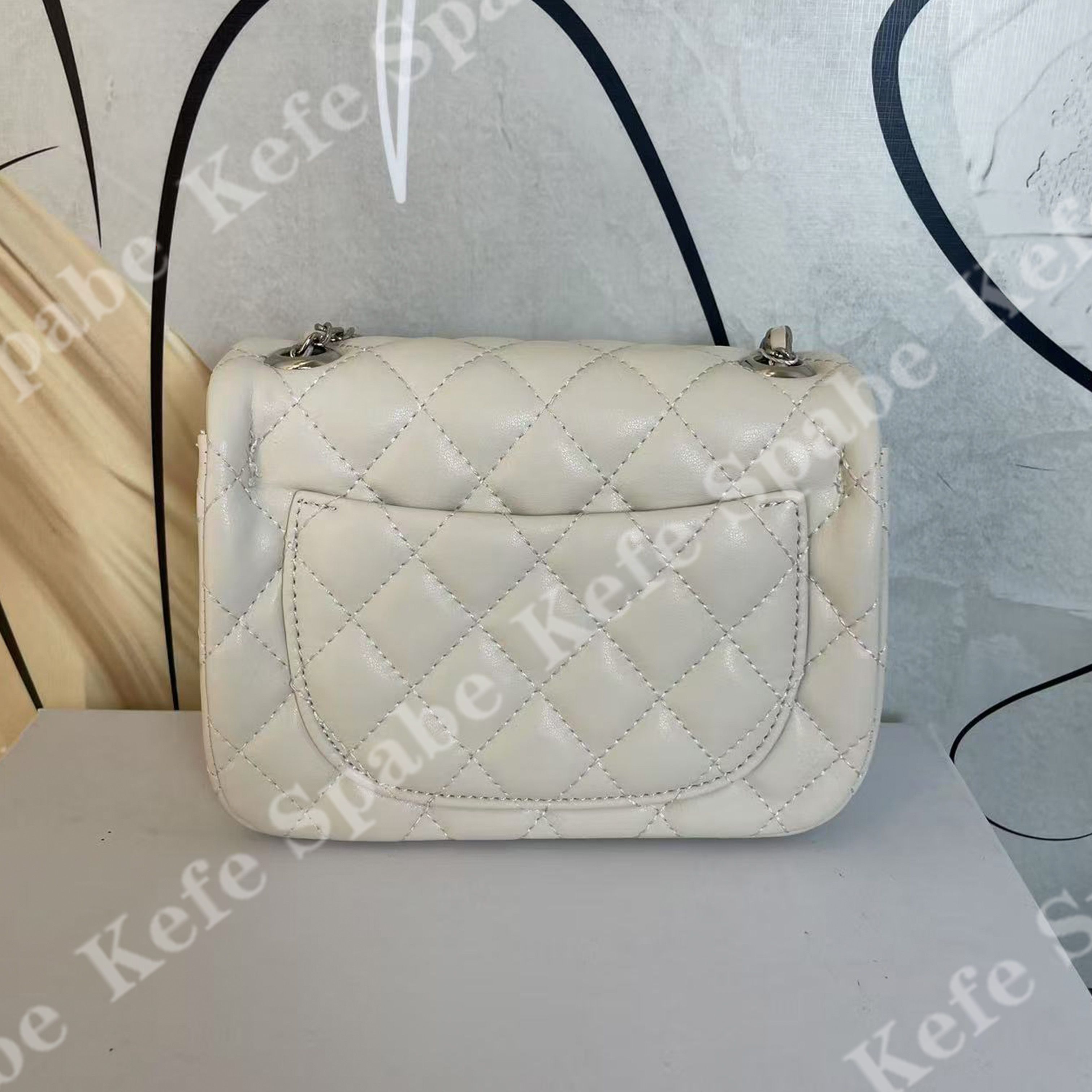 HM068  P25新款白色银球方胖子银扣单肩斜挎包-1