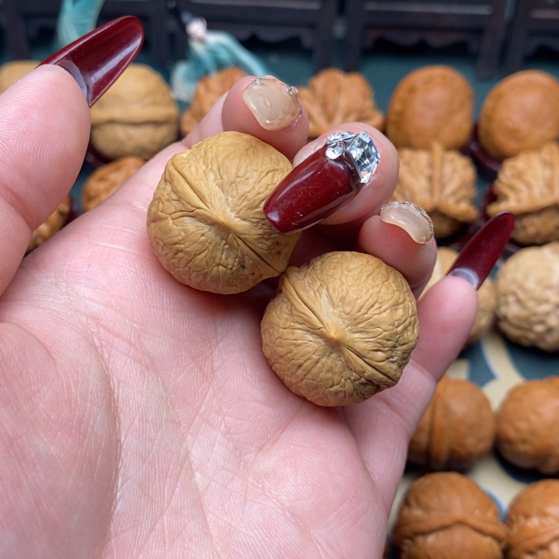 文玩核桃把件蛇皮球