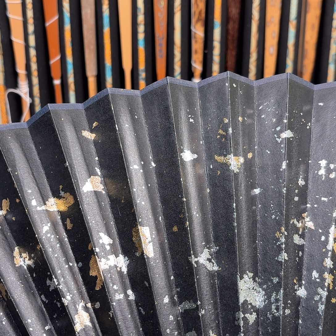 扇子全棕满天星。。