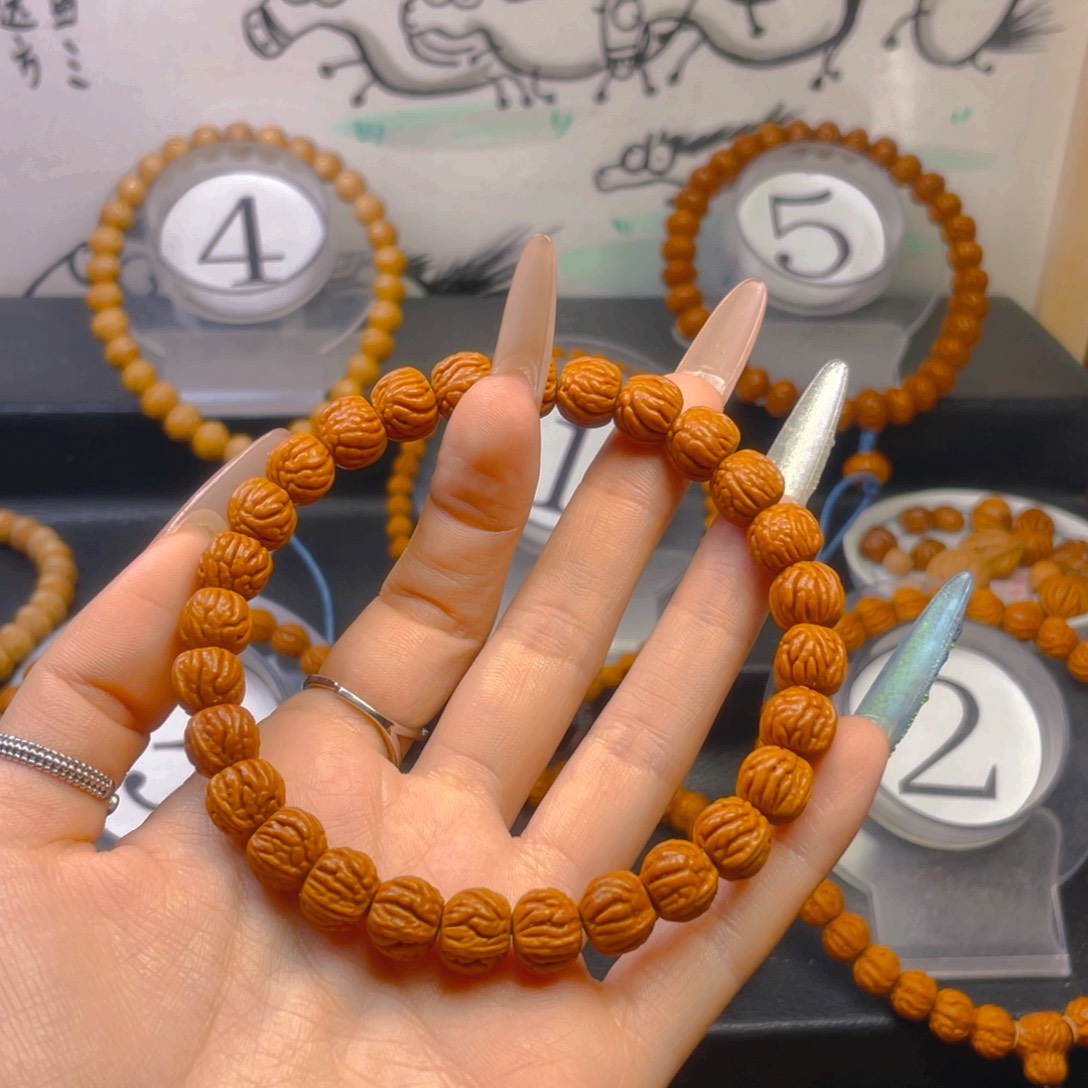 锐***尘吊坠桃核1:0000000555555