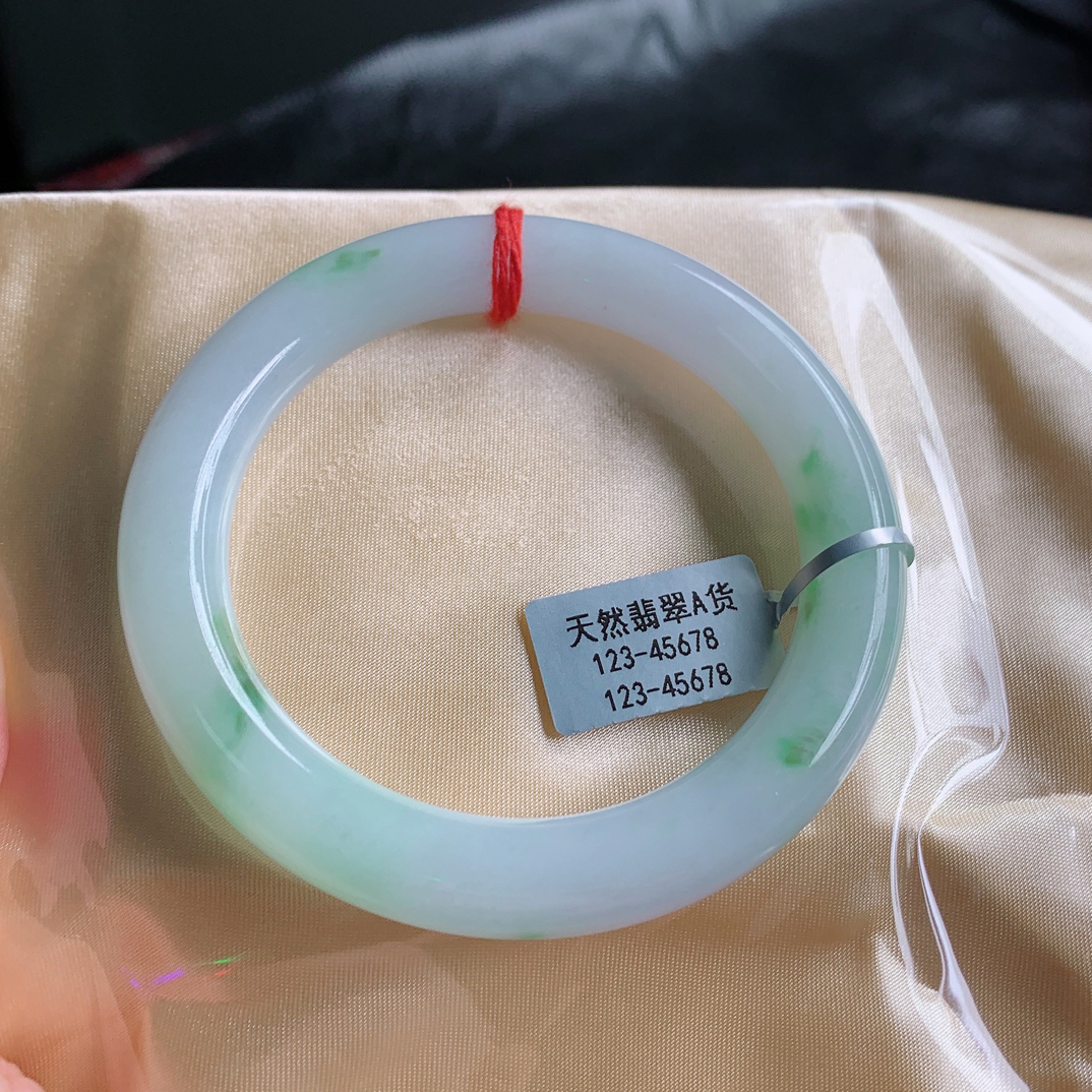 正品缅甸天然A货翡翠糯冰种细腻起胶飘阳绿58圈胖圆条