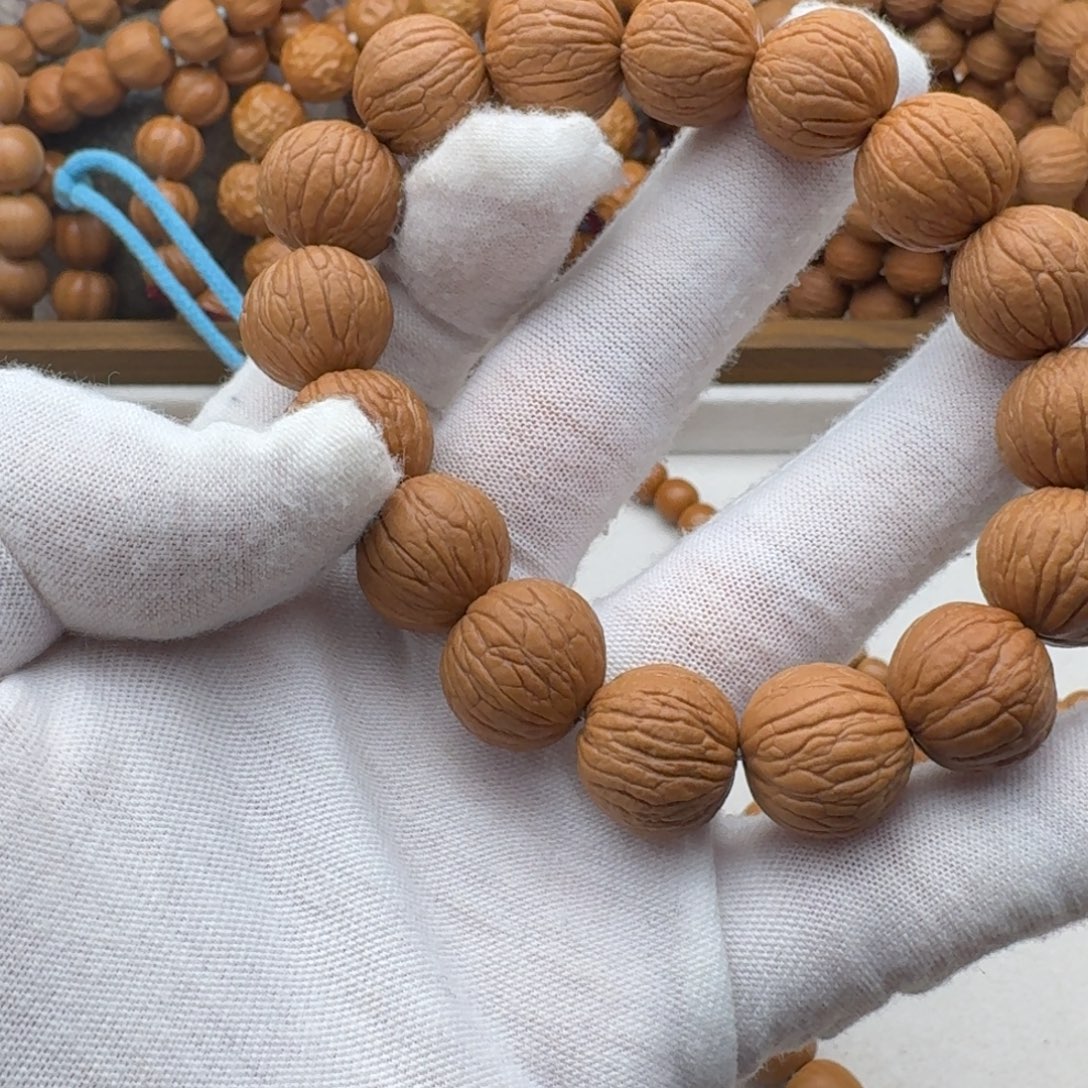 辰***皮猴头核桃手串原皮原色凤羽不同尺