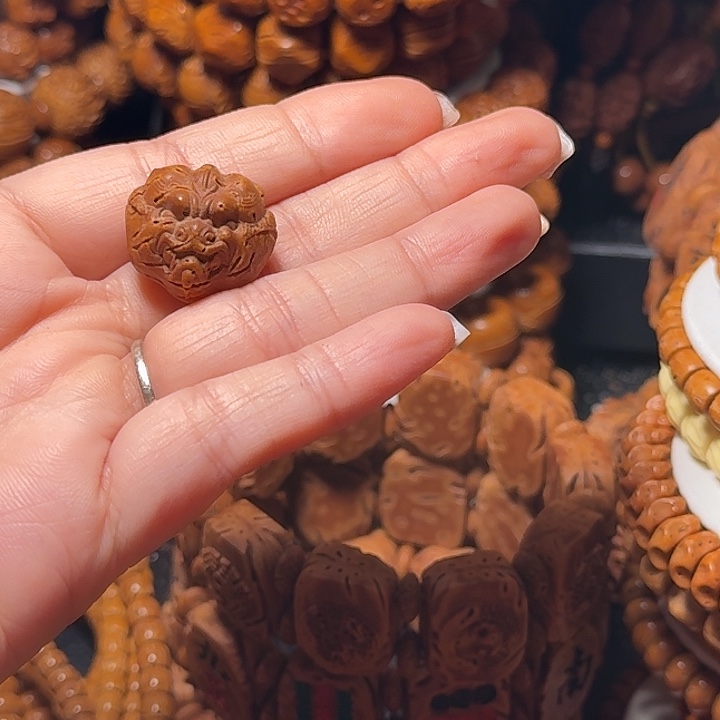 桃核手串兽面三通