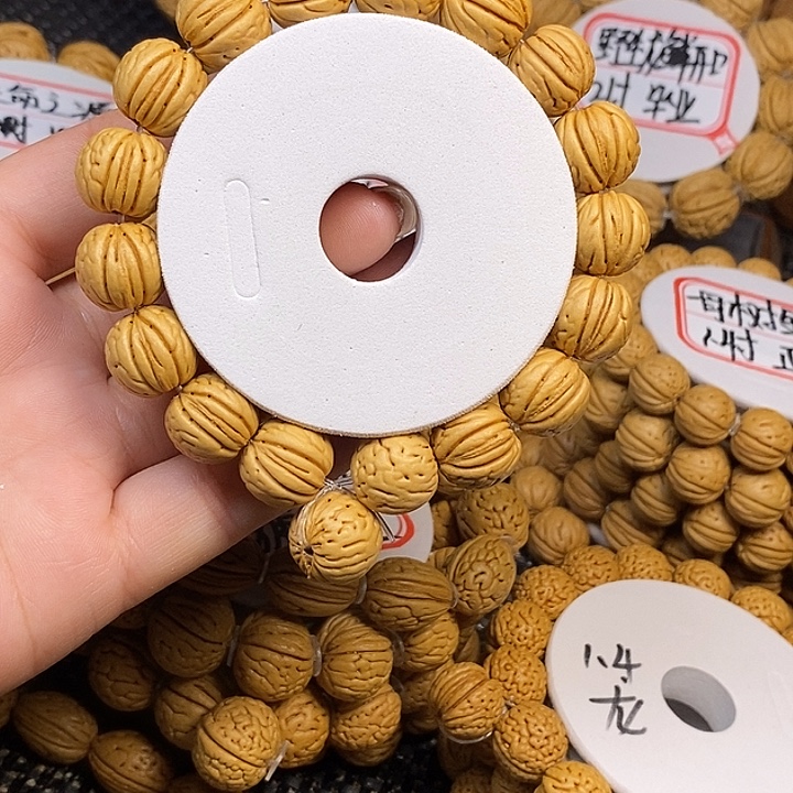 木***…桃核手串母树金丹1.5