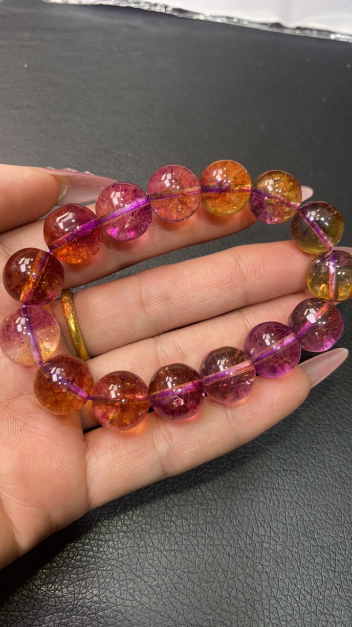 B  196 卡14极光23紫黄手链