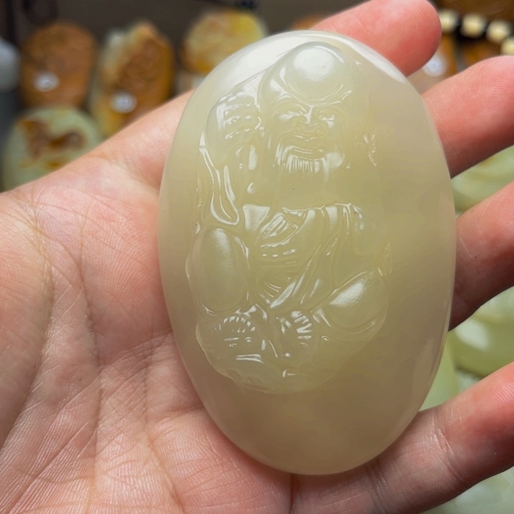 好***角石材方解石手把件