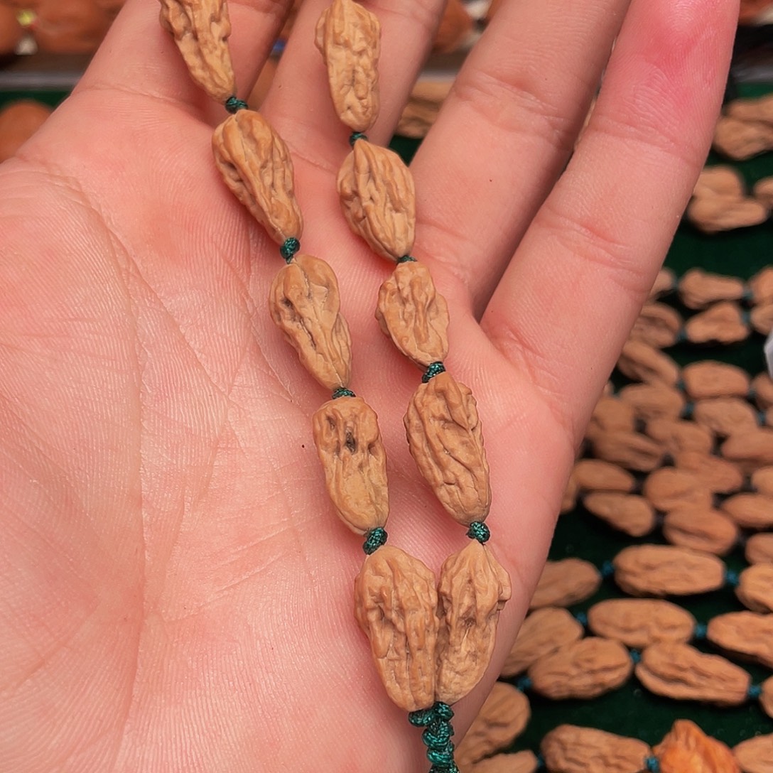 孙***坡吊坠文玩核桃异性