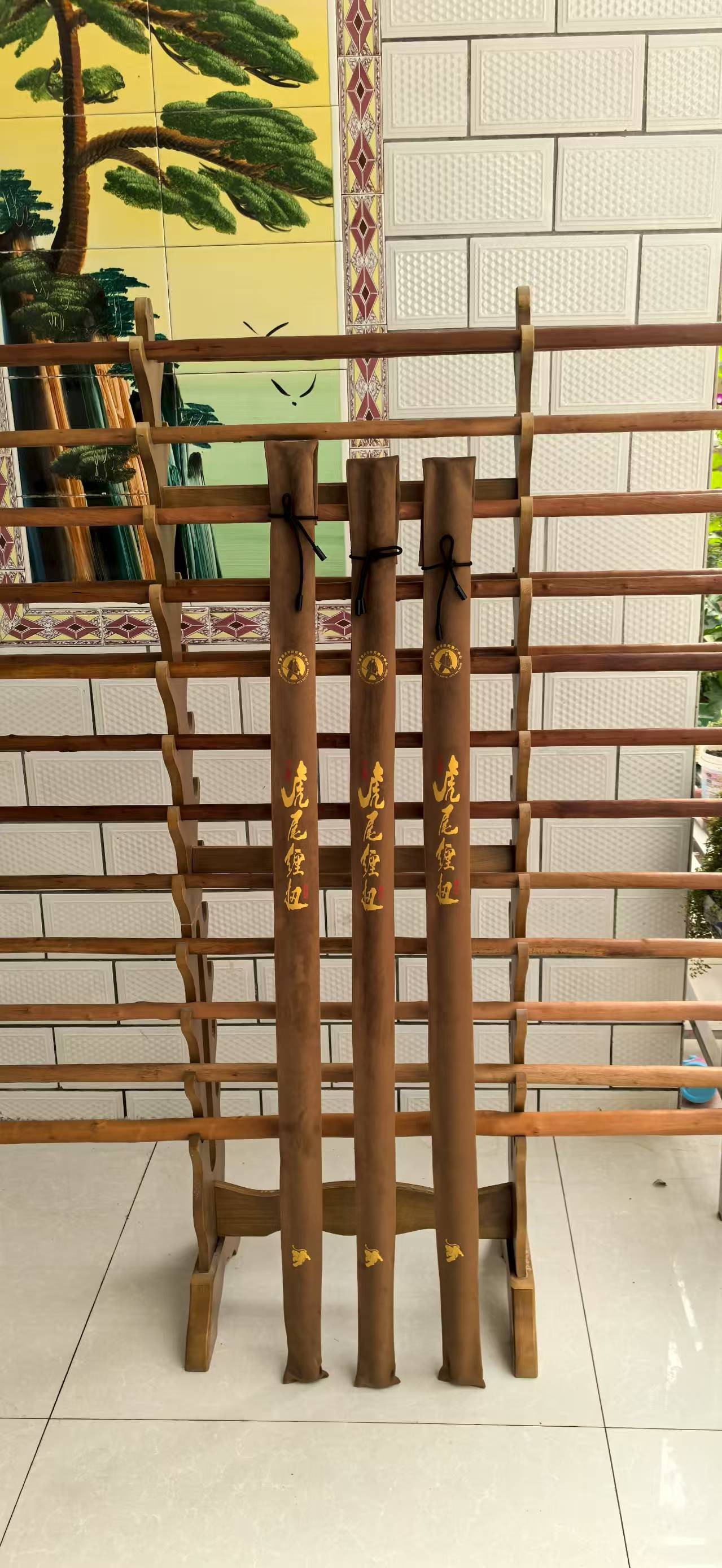 丁家虎尾缠扭酒店客厅鞭杆定制棍袋