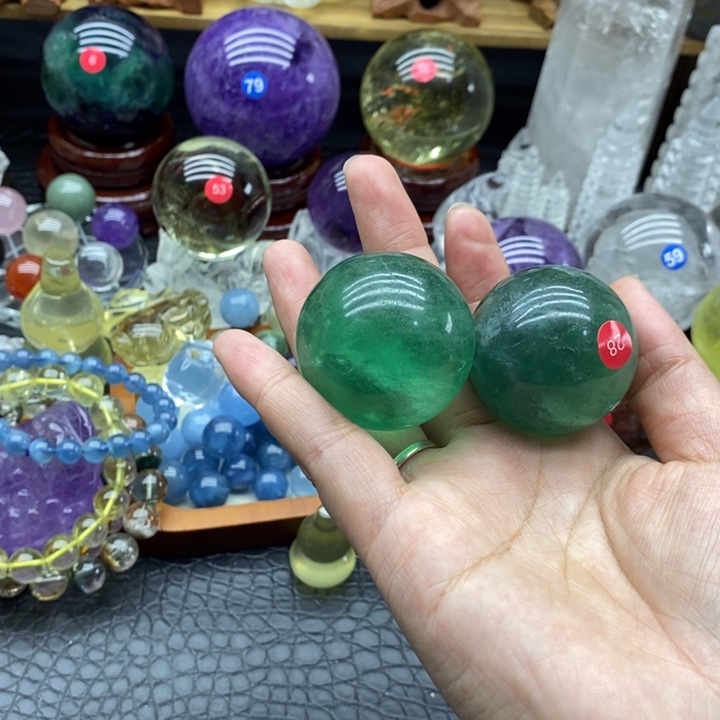 尘***凨石材天然萤石球摆件