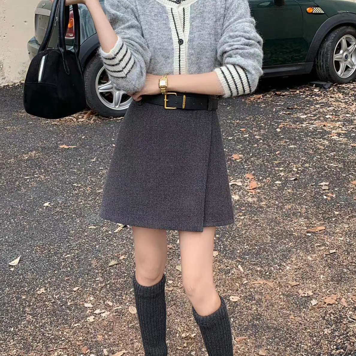 毛呢短裙女2025新款秋冬季高腰不规则黑色外穿a字阔腿休闲靴短裙