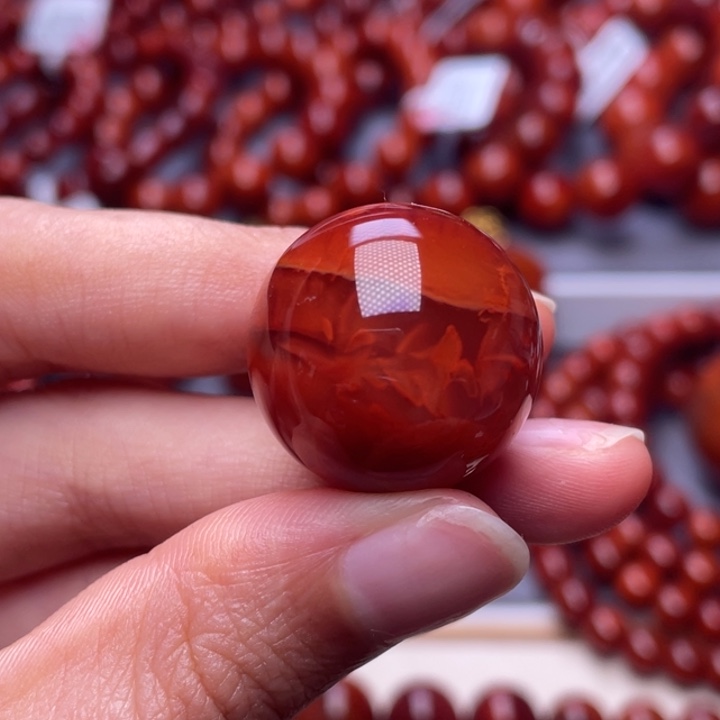 白***首南红玛瑙未镶嵌其他（原矿）22mm顶品瓦西玫红火焰圆珠