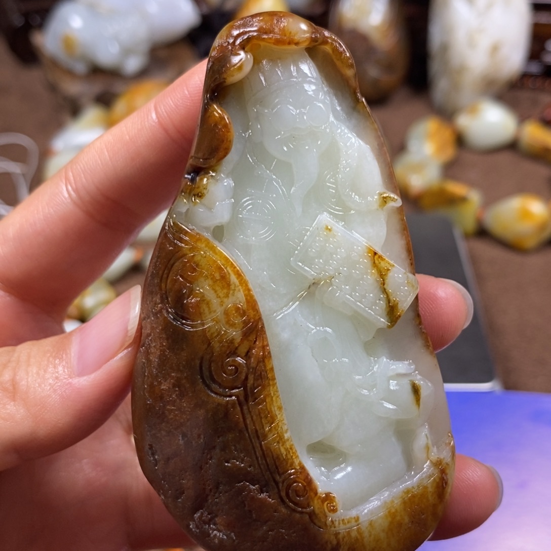 贾***平和田玉未镶嵌把件