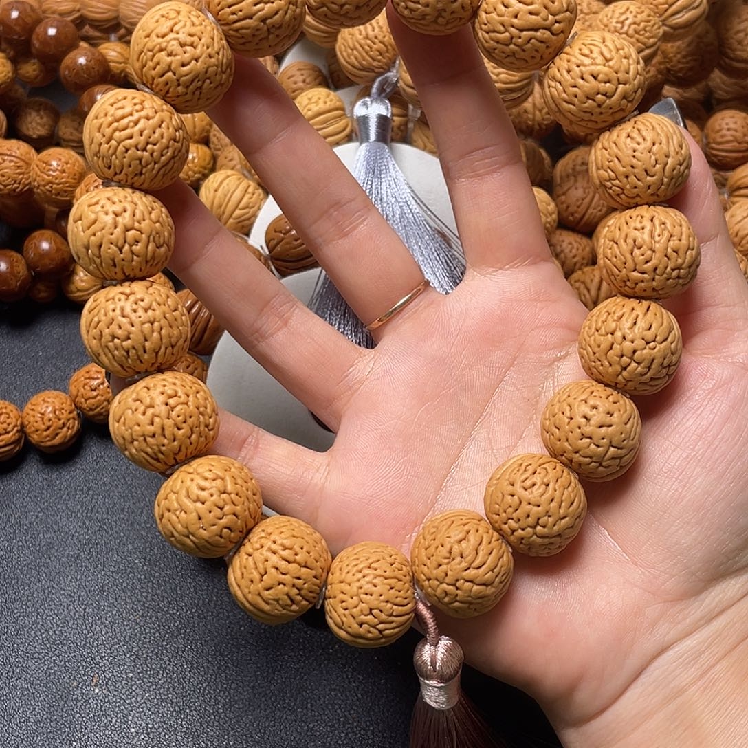 喜***薛手串桃核白月光手持