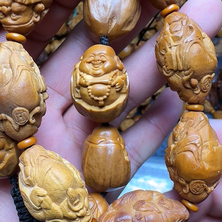 橄榄核手串你的孩子