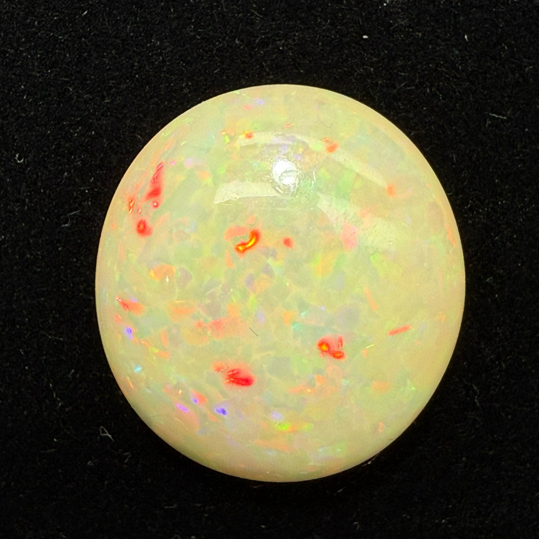 22.12ct天然彩欧泊裸石，尺寸23.2*21.3*9.3mm，颜色美艳，油画般色