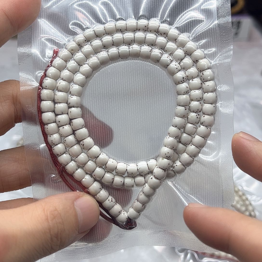 星月菩提手串5*6半臂留白针尖星河豚