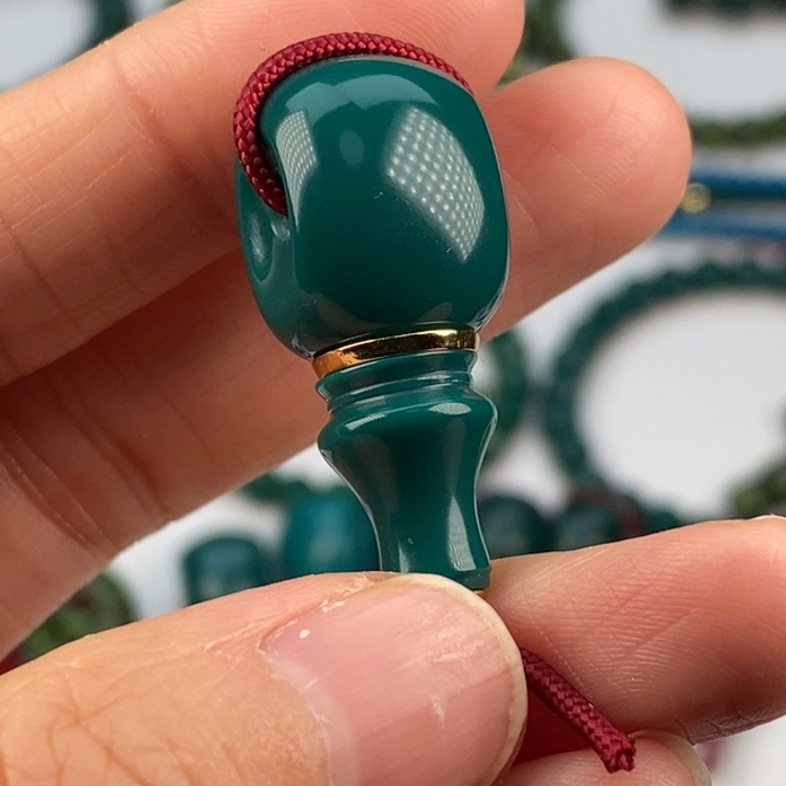 張***g玻璃毛衣链12油绿三通