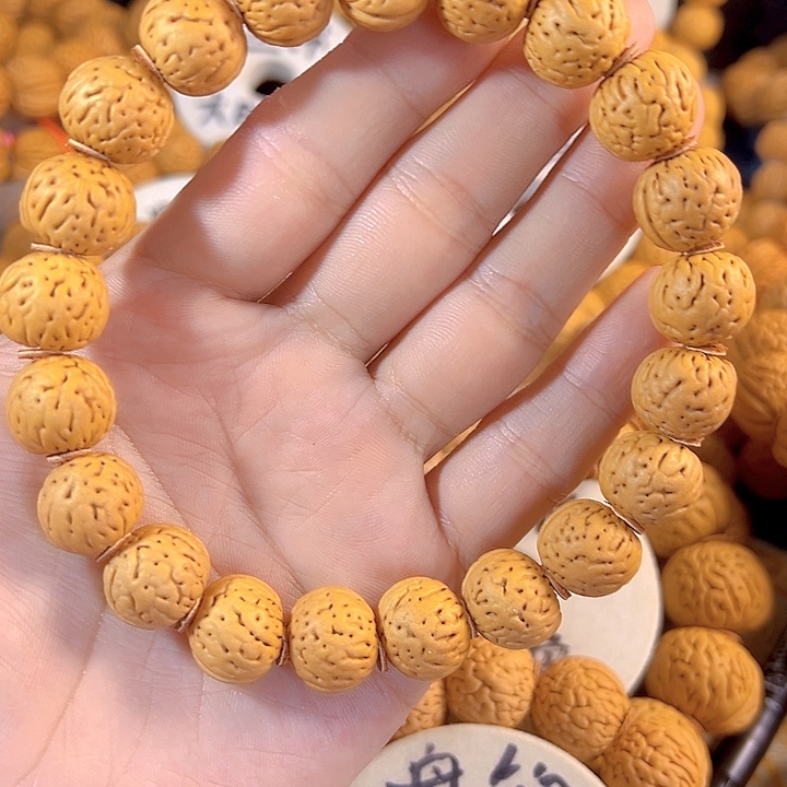 小***。桃核吊坠金丹手持