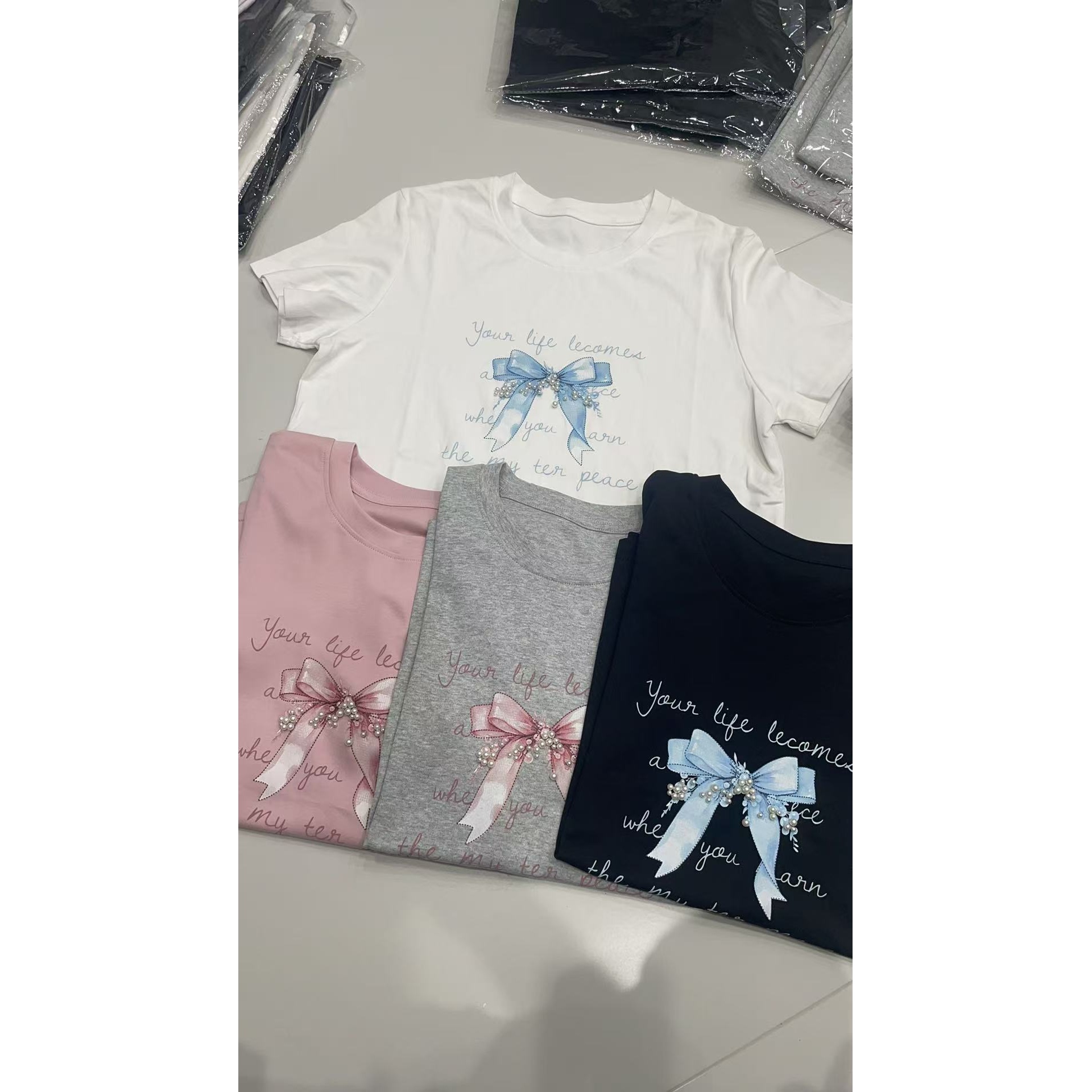 106圆领韩系减龄蝴蝶结字母印花短袖T恤