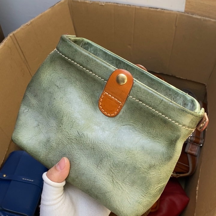 头层牛皮瑕疵单肩包