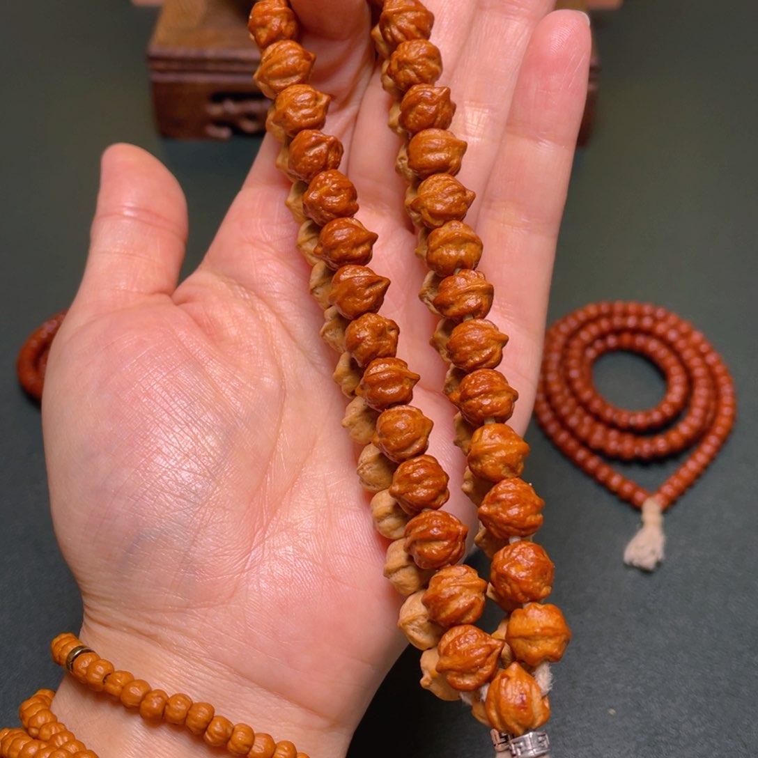 柏香籽/百香籽吊坠白牙横打手持