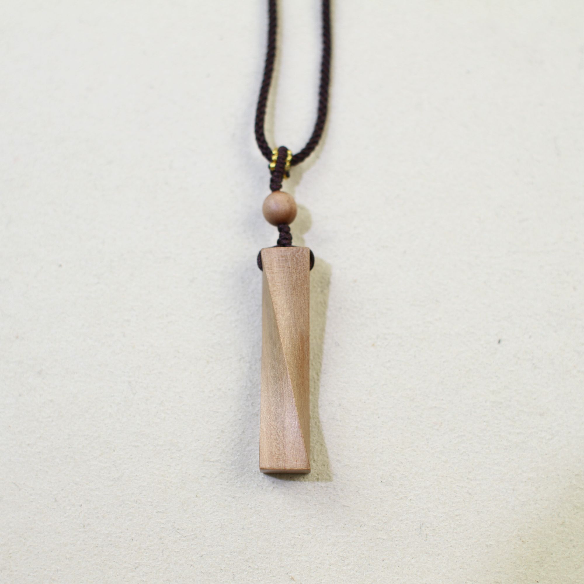 精工扭转乾坤老山檀吊坠多样性发其一