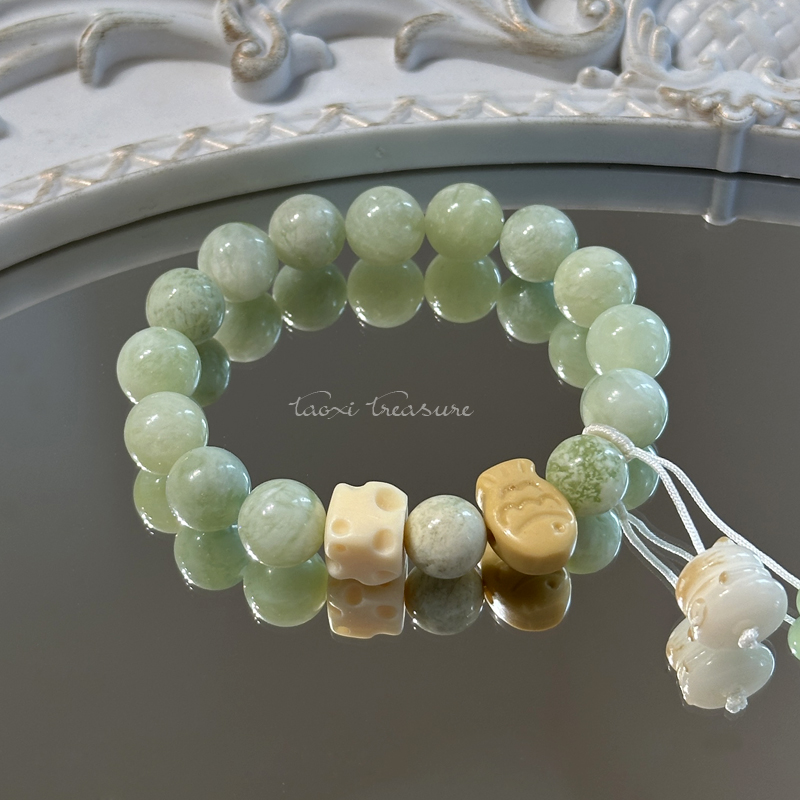 tx1221-[薄荷小鱼饼]奶盖岫玉象牙果奶酪金木鱼手串
