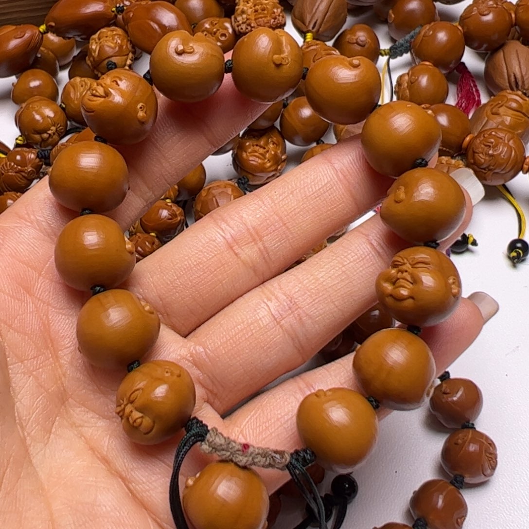 橄榄核手串抱**.橄榄核手串